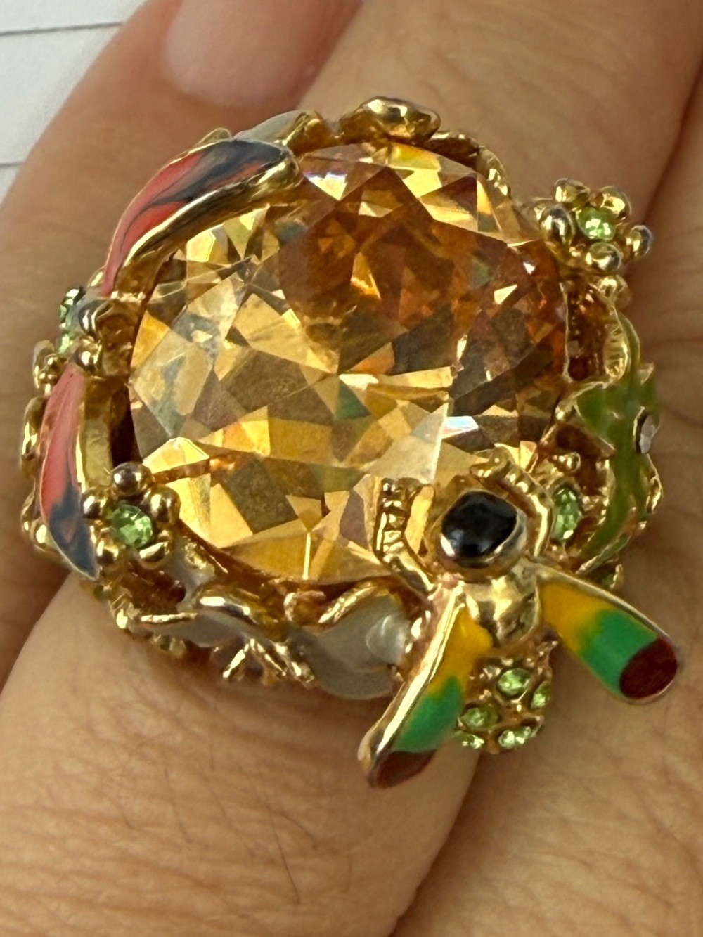 Gold-Tone Crystal Statement Ring with Amber tone crystal and enamel.